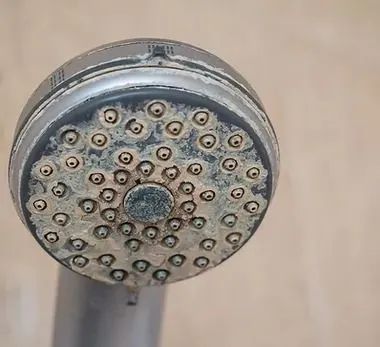Hard-water deposits and staining